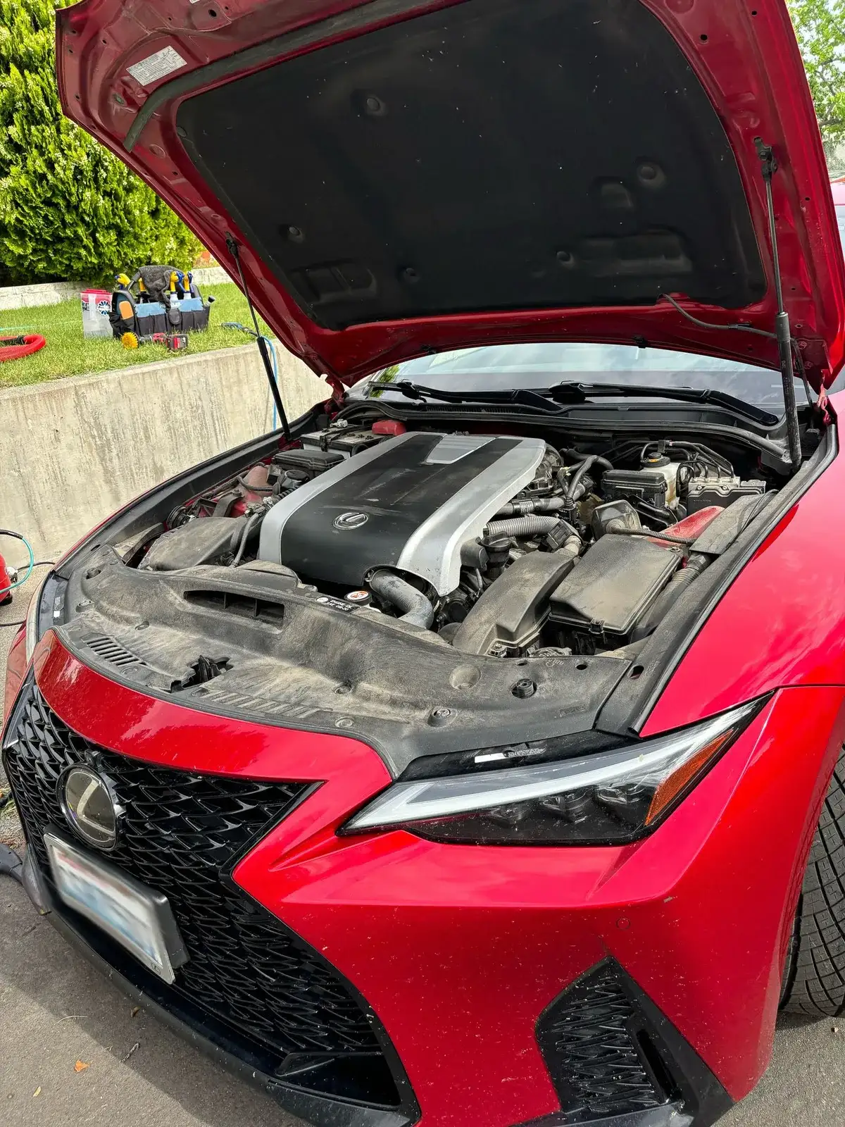 Lexus engine bay before a showroom cleanup