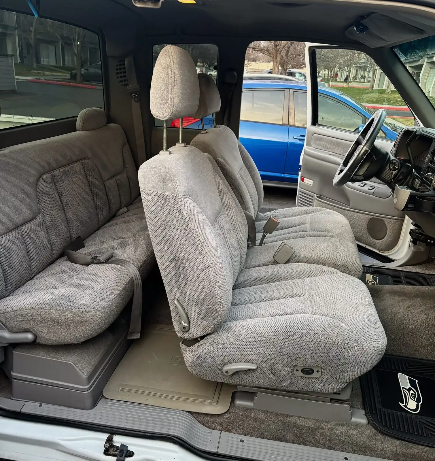 Cloth bench seats and carpet after a seat and floor shampoo